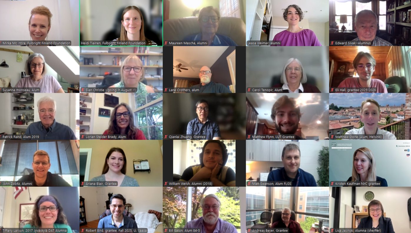 Capture of Zoom meeting with participants smiling 