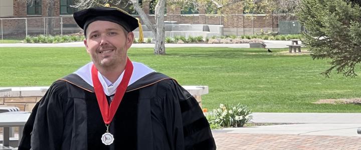 Bruce Blair in his doctoral graduation gown