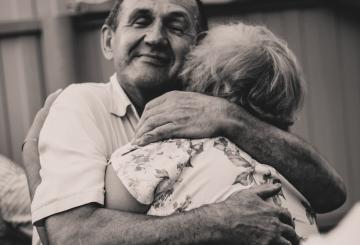 A man and woman embrasing