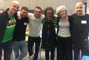 Inter-Country grantee Lorrie Heagy on her visit to Finland with new colleagues laughing after a workshop